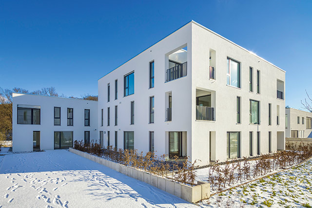 Seitenansicht Gebäude mit dem Projektteam